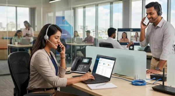 Business team communicating through IP PBX with multiple office extensions.